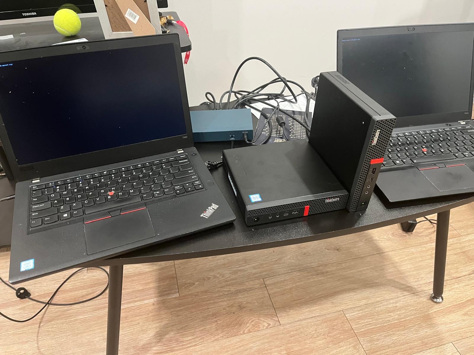The Genesis1 cluster — 2 ThinkPad masters, 2 ThinkCentre workers, running the site you're reading right now.